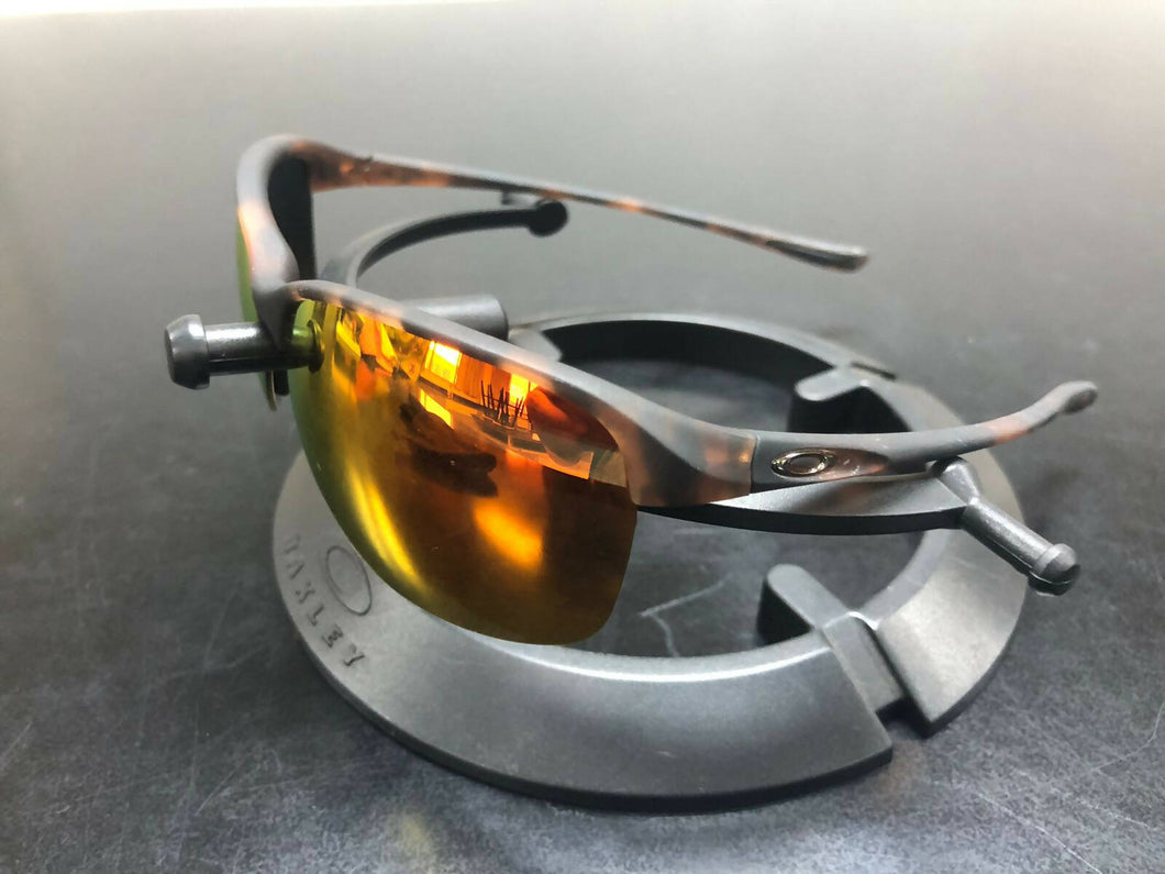 OAK - Oakley Unstoppable Brown Tortoise with Fire Red polarized lens